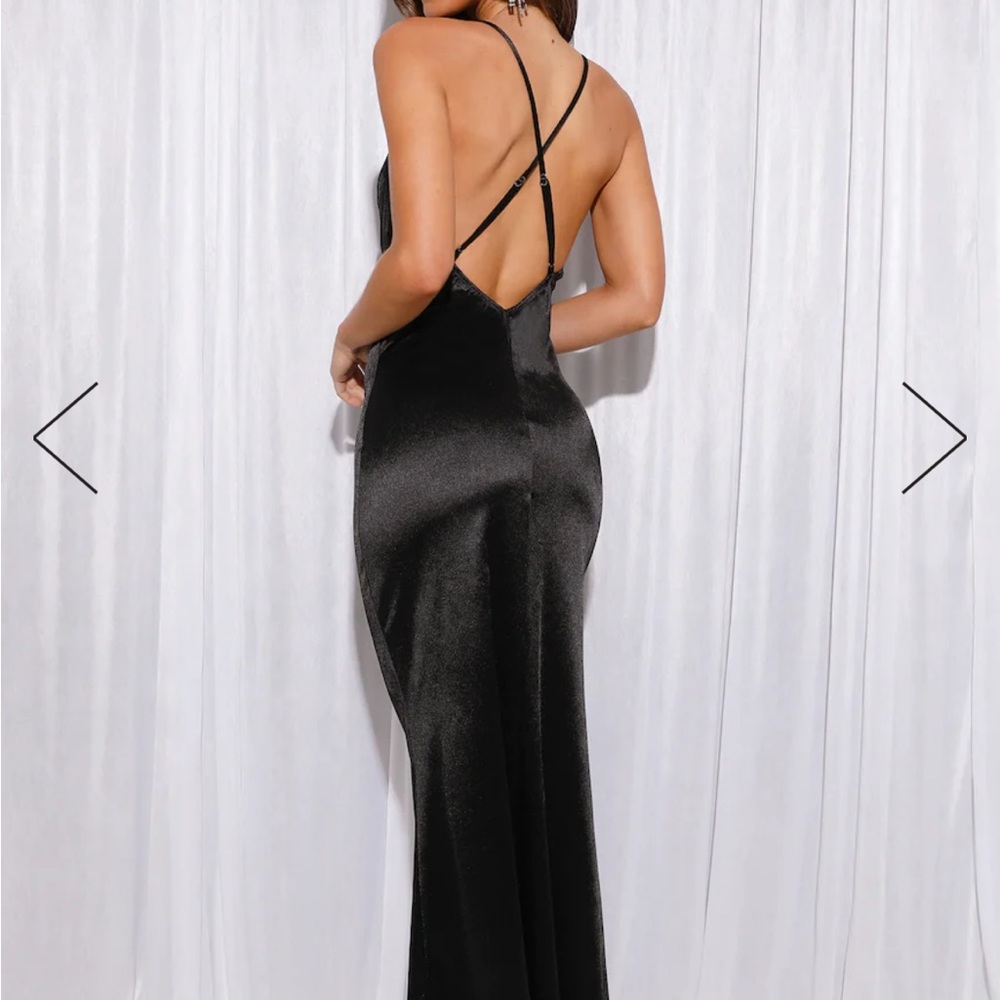 Black long dress with an open back.